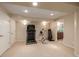 Finished basement with home gym, including treadmill and exercise bike at 1429 S Grand Baker Cir, Aurora, CO 80018