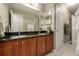 Double sink bathroom with granite countertop and tile floor at 1429 S Grand Baker Cir, Aurora, CO 80018