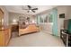 Main bedroom with wood furniture, large windows, and carpeting at 1429 S Grand Baker Cir, Aurora, CO 80018