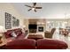 Living room with fireplace, large windows, and comfortable seating at 1429 S Grand Baker Cir, Aurora, CO 80018