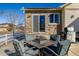 Cozy patio with fire pit and seating area at 1429 S Grand Baker Cir, Aurora, CO 80018