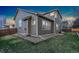 This home features a well-maintained lawn and ample drainage from the roof at 1831 Ashford Cir, Longmont, CO 80504