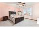 Bedroom with a modern bed, carpet and a window providing natural light at 1831 Ashford Cir, Longmont, CO 80504