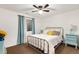 Bedroom featuring a silver bedframe, modern decor, carpet and natural light at 1831 Ashford Cir, Longmont, CO 80504
