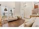 Inviting living room showcasing high ceilings, large windows, and comfortable furnishings at 1831 Ashford Cir, Longmont, CO 80504
