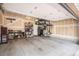 Spacious garage with ample storage shelving and a functional layout at 17996 E 54Th Ave, Denver, CO 80249