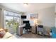 Bright office space with dual monitors, large window, and comfortable seating for a productive work environment at 17996 E 54Th Ave, Denver, CO 80249