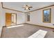 Bright bedroom with carpet flooring, natural lighting, and trim at 1294 Red Lodge Dr, Evergreen, CO 80439