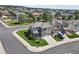 Two-story house with gray exterior, situated in a residential neighborhood at 1303 Yellow Granite Way, Monument, CO 80132