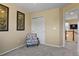 Bedroom with sitting area and access to hallway at 1303 Yellow Granite Way, Monument, CO 80132