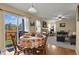 Dining area with a table and chairs, open to the kitchen at 1303 Yellow Granite Way, Monument, CO 80132