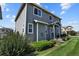 Gray house with landscaping and small patio at 1303 Yellow Granite Way, Monument, CO 80132