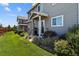 Backyard with patio and grill, plus green grass at 1303 Yellow Granite Way, Monument, CO 80132