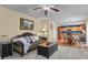 Open living room with a view of the kitchen and dining area at 1303 Yellow Granite Way, Monument, CO 80132