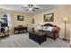 Living room with fireplace and leather sofa at 1303 Yellow Granite Way, Monument, CO 80132