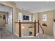 Upstairs hallway with view of the second floor and staircase at 1303 Yellow Granite Way, Monument, CO 80132