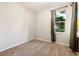 Bedroom with carpet floor, window, and neutral color scheme at 10480 Truckee St # B, Commerce City, CO 80022