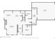Detailed first floor plan showcasing living room, dining room, kitchen, bedroom, and garage at 10480 Truckee St # B, Commerce City, CO 80022