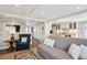 Spacious living room with hardwood floors and an open layout perfect for entertaining guests at 5172 S Cody Ct, Littleton, CO 80123