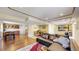 The finished basement includes a bar area, lounge, and gaming area at 1647 Harris Ct, Erie, CO 80516
