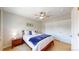 Inviting bedroom with a ceiling fan, closet and neutral tones create a relaxing atmosphere at 1647 Harris Ct, Erie, CO 80516