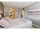Main bedroom with ensuite bathroom and walk-in closet at 10056 W Unser Dr # 102, Littleton, CO 80127