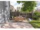 Cozy backyard with a patio area, shaded by mature trees, provides a tranquil escape at 277 S Gilpin St, Denver, CO 80209