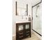 Modern bathroom featuring a glass enclosed shower, stylish vanity, and contemporary fixtures at 277 S Gilpin St, Denver, CO 80209