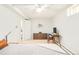 Bright bedroom showcasing neutral paint, modern furniture, and ample natural light at 277 S Gilpin St, Denver, CO 80209