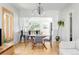 Chic dining area with pendant lighting and an open view to the kitchen at 277 S Gilpin St, Denver, CO 80209