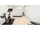 Home exercise room with bike, yoga mat and free weights at 277 S Gilpin St, Denver, CO 80209