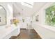 Sunroom with large window, skylight, countertop workstation, and colorful tiled floor at 277 S Gilpin St, Denver, CO 80209