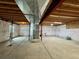 Unfinished basement offering a large, versatile space for storage or future customization at 14545 Barksdaly Way, Keenesburg, CO 80643
