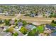 Stunning aerial view of a neighborhood with lush landscaping and a community feel at 3749 White Bay Dr, Highlands Ranch, CO 80126