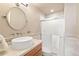 Bathroom featuring vessel sink, marble counters, and a glass enclosed shower at 3749 White Bay Dr, Highlands Ranch, CO 80126