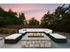 Stylish outdoor fire pit surrounded by comfortable seating, perfect for relaxing evenings at 3749 White Bay Dr, Highlands Ranch, CO 80126