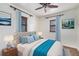 Bright bedroom with two windows, natural light, and hardwood floors at 3790 W 54Th Ave, Denver, CO 80221
