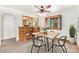 Cozy dining room with natural light, wood accents, and modern furnishings at 3790 W 54Th Ave, Denver, CO 80221