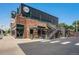 This South Broadway Country Club building features brick and a sleek metal exterior at 3790 W 54Th Ave, Denver, CO 80221