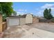 This property features a one-car garage and additional outbuilding for extra storage at 3790 W 54Th Ave, Denver, CO 80221