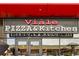 Eye-catching restaurant signage above the entrance, creating a memorable and recognizable brand presence at 1335 S Holly St, Denver, CO 80222