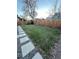 Spacious backyard with grassy area and stone pathway at 3470 W 42Nd Ave, Denver, CO 80211