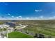 Backyard features a lush lawn, pathway, and scenic views, perfect for outdoor enjoyment and relaxation at 6860 S Yantley Ct, Aurora, CO 80016