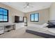 Inviting bedroom featuring bright windows with scenic views and stylish decor at 6860 S Yantley Ct, Aurora, CO 80016