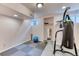 Home gym with padded flooring, weight equipment, and bright lighting at 8167 S Wabash Ct, Centennial, CO 80112
