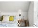 Comfortable bedroom with accent lighting, natural light and views at 2645 S Xanadu Way # C, Aurora, CO 80014