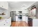Updated kitchen offering stainless steel appliances, granite countertops, and plenty of storage space at 2645 S Xanadu Way # C, Aurora, CO 80014