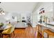 Open concept layout showcasing living room, dining room, and kitchen at 2645 S Xanadu Way # C, Aurora, CO 80014