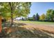 Community park featuring open green space, trees, and walking path through the neighborhood at 5374 W Canyon Trl # B, Littleton, CO 80128