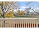 Scenic view from the deck of a lush green lawn and trees at 5374 W Canyon Trl # B, Littleton, CO 80128